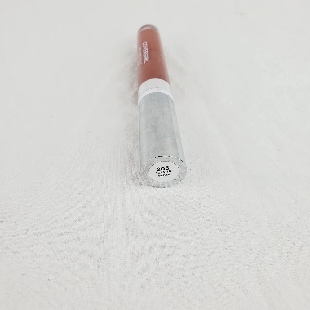 Covergirl melting pout Vinyl Vow Lip Gloss